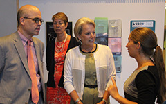 W&M Provost Michael Halleran (left) and W&M Board of Visitors member Susan Gerdelman (center) congratulate Nadya Mamoozadeh (right) on her second-place win.