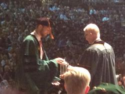 W&M President Taylor Reveley presents VIMS graduate student Jonathan Lefcheck with the Thatcher Prize. © L. Schaffner.