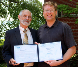 VIMS Dean and Director John Wells and Professor Mark Brush.