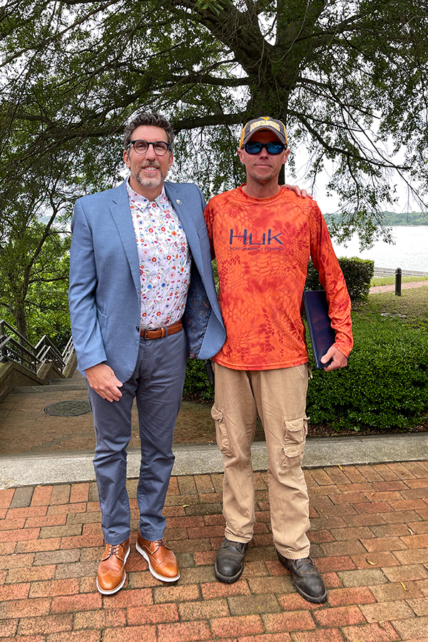 Justin Paul, winner of the 2021 Outstanding Employee in Facilities/Safety/Trades, with Dean & Director Dr. Derek Aday.